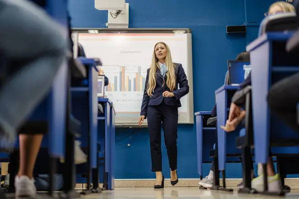 depositphotos_689642080-stock-photo-female-student-university-uniform-going